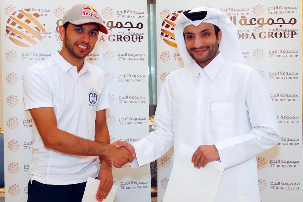Al Bidda Group Chairman Sheikh Suhaim bin Abdul Aziz Al Thani and Qatar rising squash player Abdulla Al Tamimi shake hands after signing the sponsorship deal in Doha, yesterday.