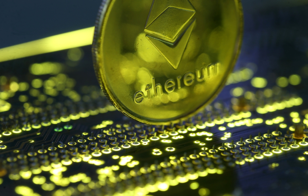 Representation of the Ethereum virtual currency standing on the PC motherboard is seen in this illustration picture dated February 3, 2018. Reuters / Dado Ruvic