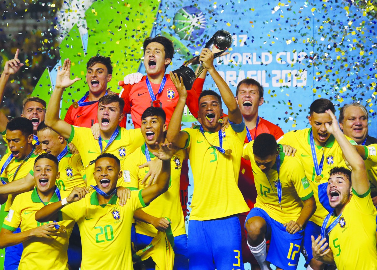 Brazil’s players celebrate with their medals after winning the FIFA U-17 Men's World Cup Brazil 2019 final football match against Mexico at the Bezerrao Stadium in gama, Brasilia, Brazil, on November 17, 2019.AFP / Miguel Schincariol
 