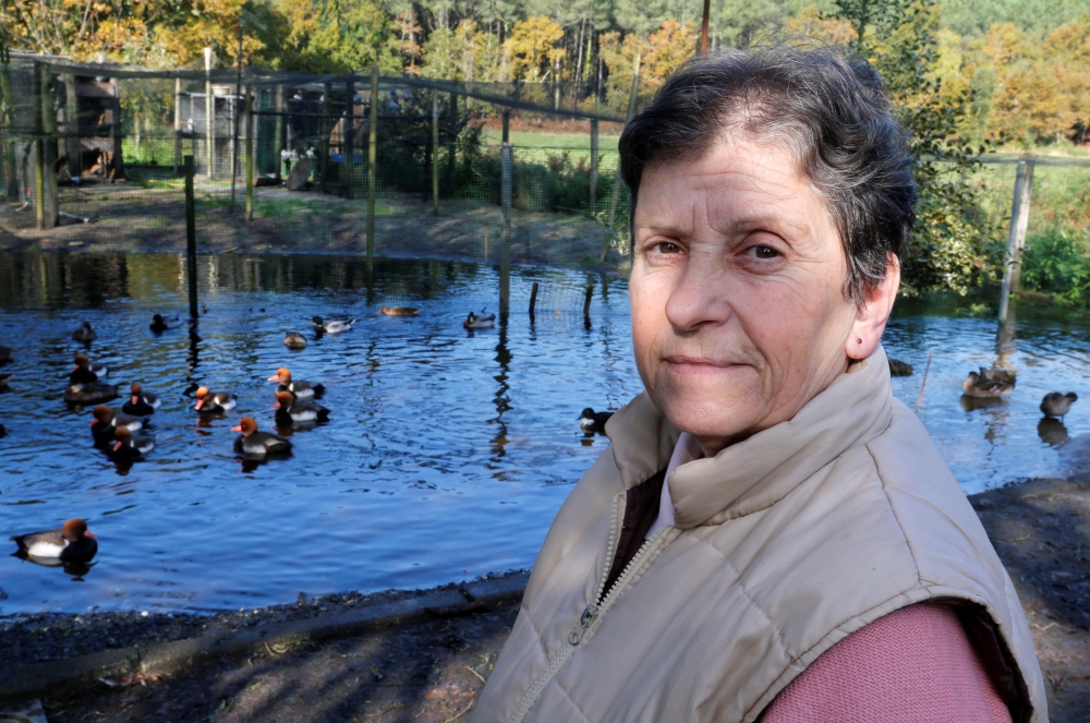 Dominique Douthe, whose neighbours took her to court over her ducks' loud quacking, poses next to her ducks in Soustons, France, November 18, 2019. Picture taken November 18, 2019. Reuters/Regis Duvignau