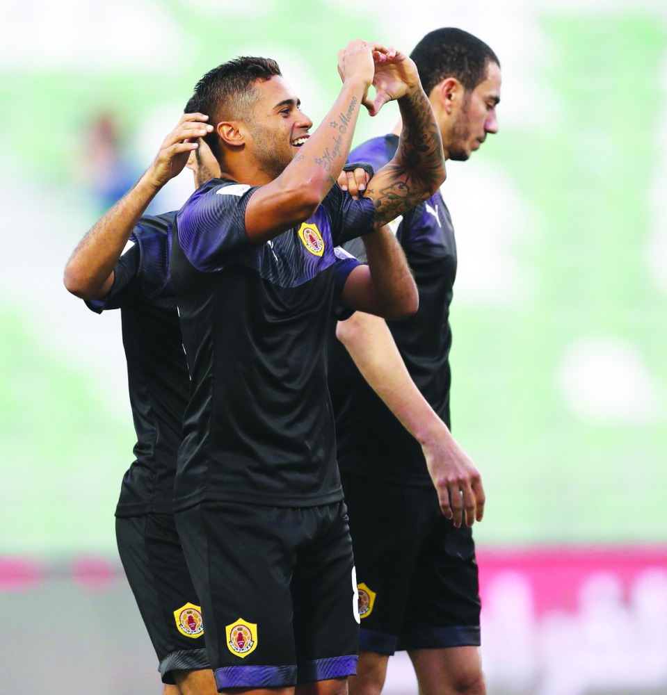 Qatar SC’s Kayke Rodrigues (centre), celebrates after scoring a hat-trick against Al Gharafa in Round 2.