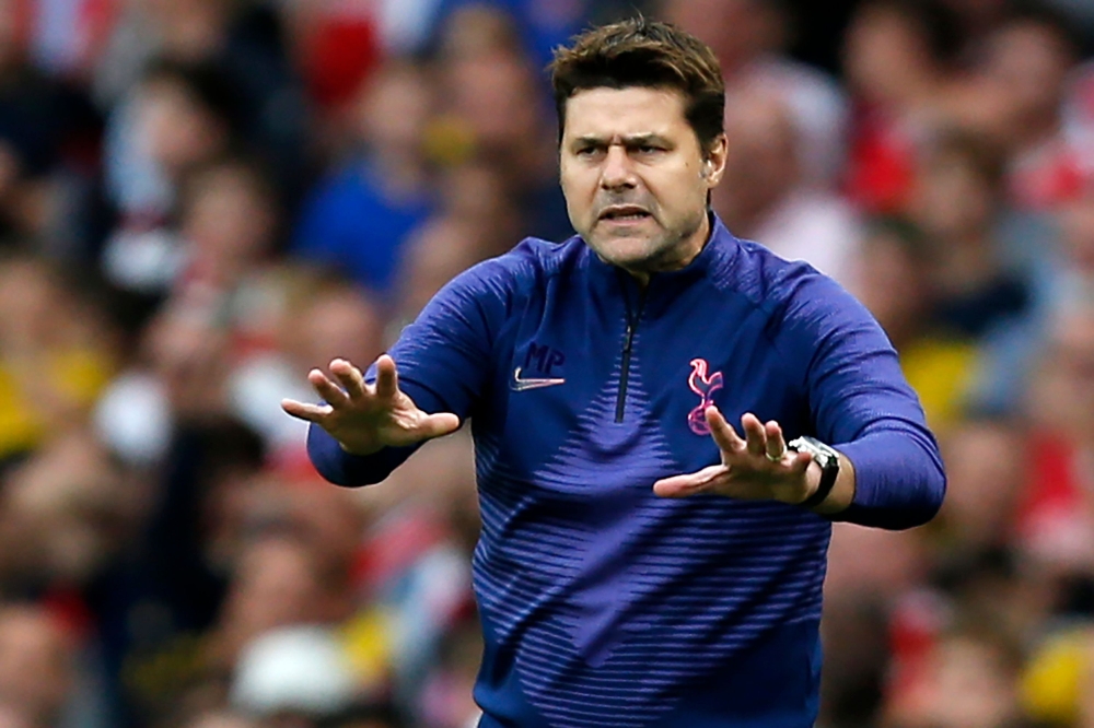 (FILES) In this file photo taken on September 01, 2019 Tottenham Hotspur's Argentinian head coach Mauricio Pochettino gestures on the touchline during the English Premier League football match between Arsenal and Tottenham Hotspur at the Emirates Stadium 