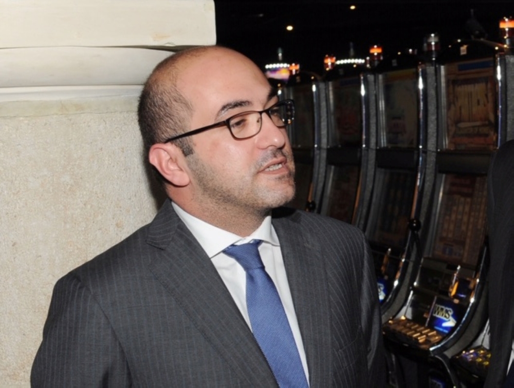 Yorgen Fenech of the Tumas Group talks with VIP guests during the opening of the Oracle Casino in St Paul's Bay, Malta, June 4, 2014. Picture taken June 4, 2014. Jeremy Wonnacott/Malta Government Department of Information/Handout via REUTERS 