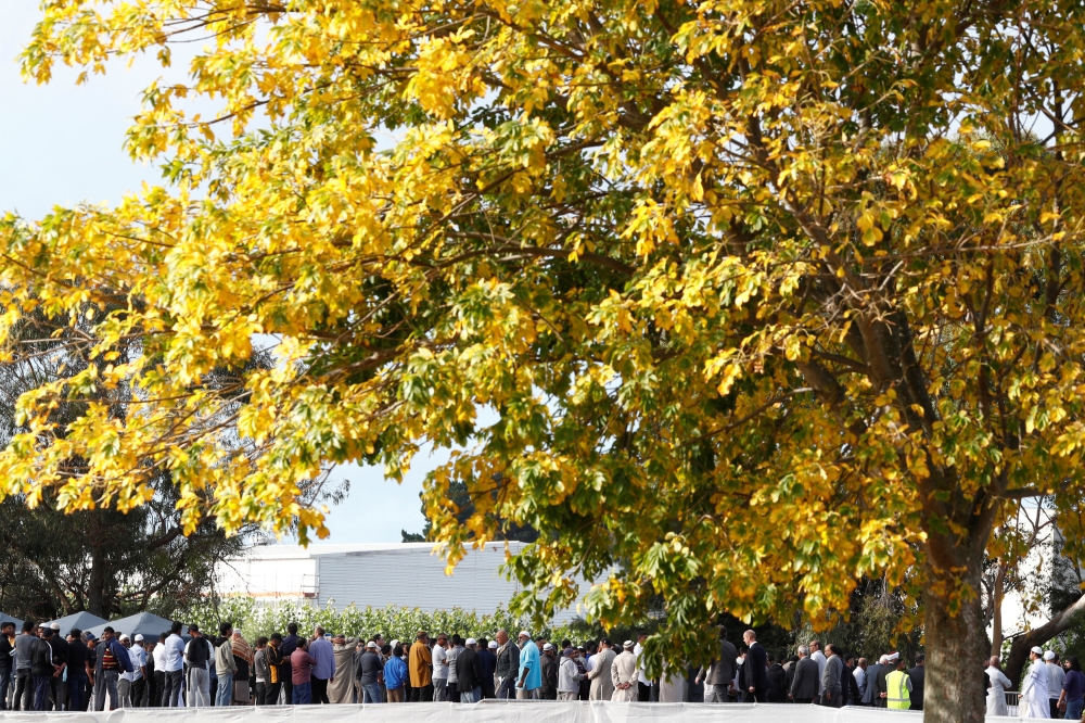 People at the Memorial Park Cemetery in Christchurch, New Zealand , March 20, 2019. Reuters / Edgar Su