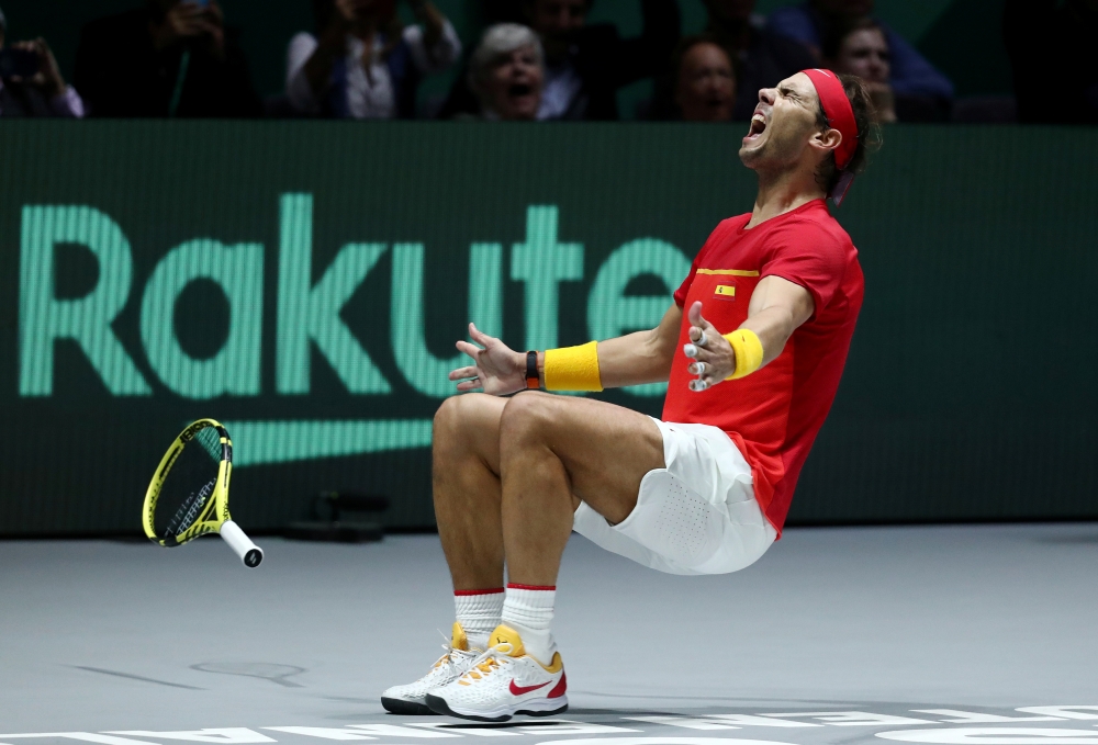 Spain's Rafael Nadal celebrates after winning his match against Canada's Denis Shapovalov and winning the Davis Cup, Madrid, Spain - November 24, 2019. Reuters/Sergio Perez 