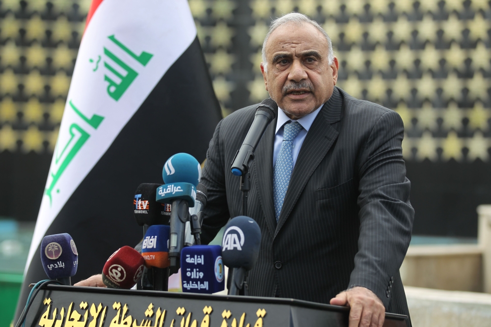 (FILES) In this file photo taken on October 23, 2019, Iraq's Prime Minister Adel Abdel Mahdi speaks during a funeral ceremony in Baghdad on October 23, 2019. AFP / AHMAD AL-RUBAYE
