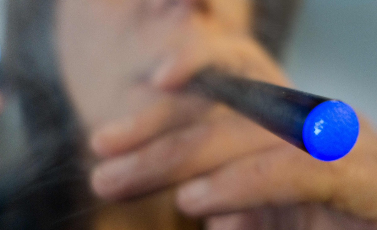 A woman smoking e-cigarette in Washington. AFP / Paul J Richards