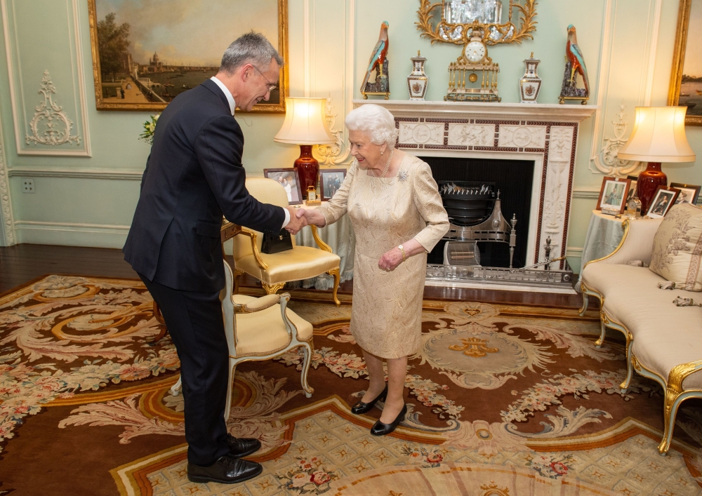 Britain's Queen Elizabeth II (R) hosts NATO Secretary General Jens Stoltenberg during a private audience at Buckingham Palace in central London on December 3, 2019, prior to the NATO alliance summit. AFP pool / Dominic Lipinski
 