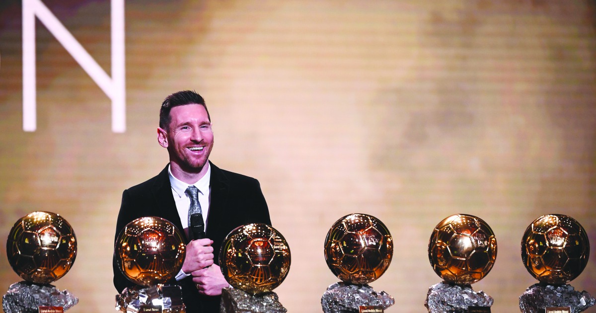 Barcelona's Argentinian forward Lionel Messi reacts after winning the Ballon d'Or France Football 2019 trophy at the Chatelet Theatre in Paris on December 2, 2019. AFP / Franck Fife