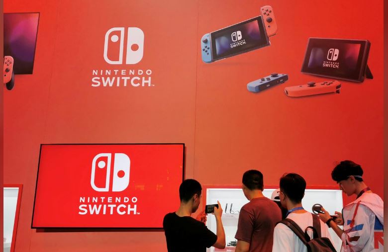 File photo: Visitors are seen at a booth of Nintendo Switch at the China Digital Entertainment Expo and Conference, also known as ChinaJoy, in Shanghai, China August 2, 2019. REUTERS/Pei Li