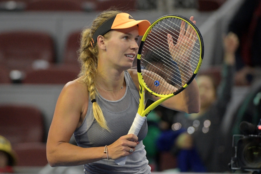 Caroline Wozniacki of Denmark reacting after her women's singles quarter-final match . December 6, 2019. / AFP / NOEL CELIS