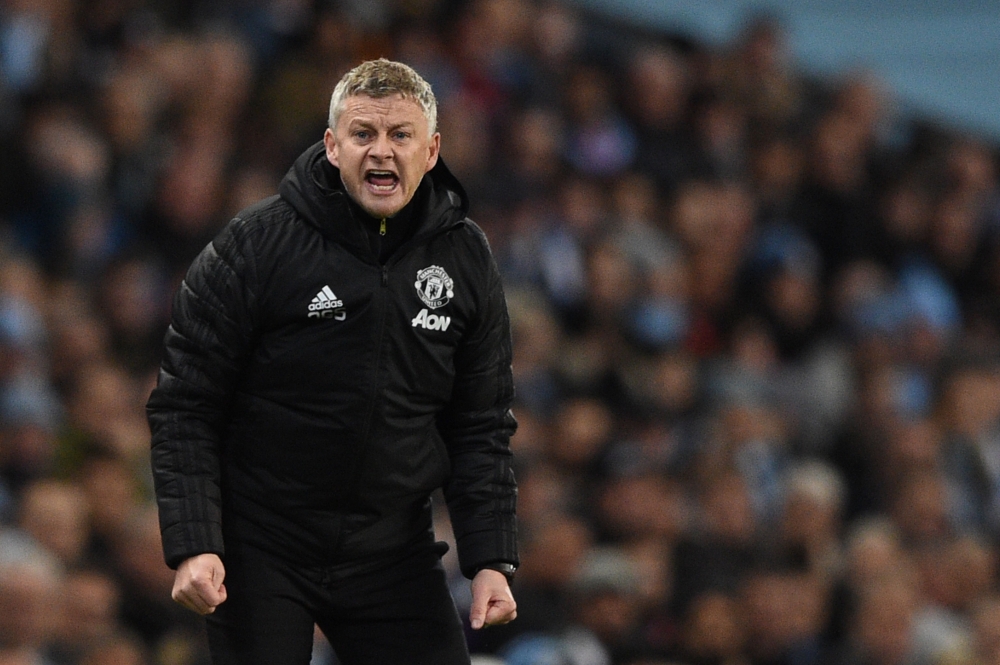 Manchester United's Norwegian manager Ole Gunnar Solskjaer reacts on the touchline during the English Premier League football match between Manchester City and Manchester United at the Etihad Stadium in Manchester, north west England, on December 7, 2019.