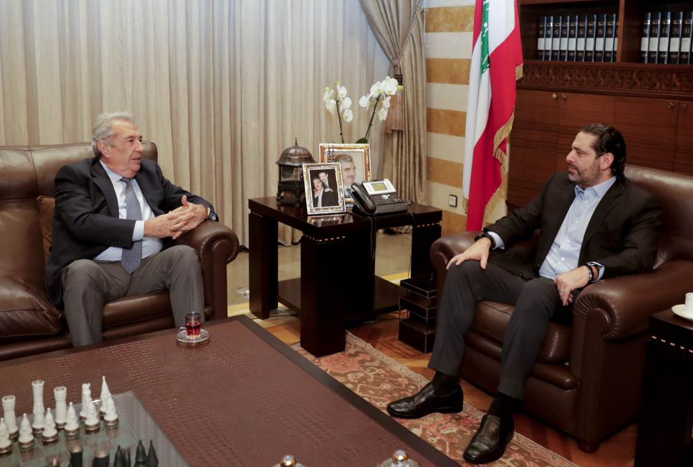 Resigned Lebanese prime minister Saad Hariri (R) meets with Samir Khatib, a Lebanese businessman who is the front-runner to form a new government, in the capital Beirut on December 8, 2019.  AFP / SERVICES AFP / ANWAR AMRO
