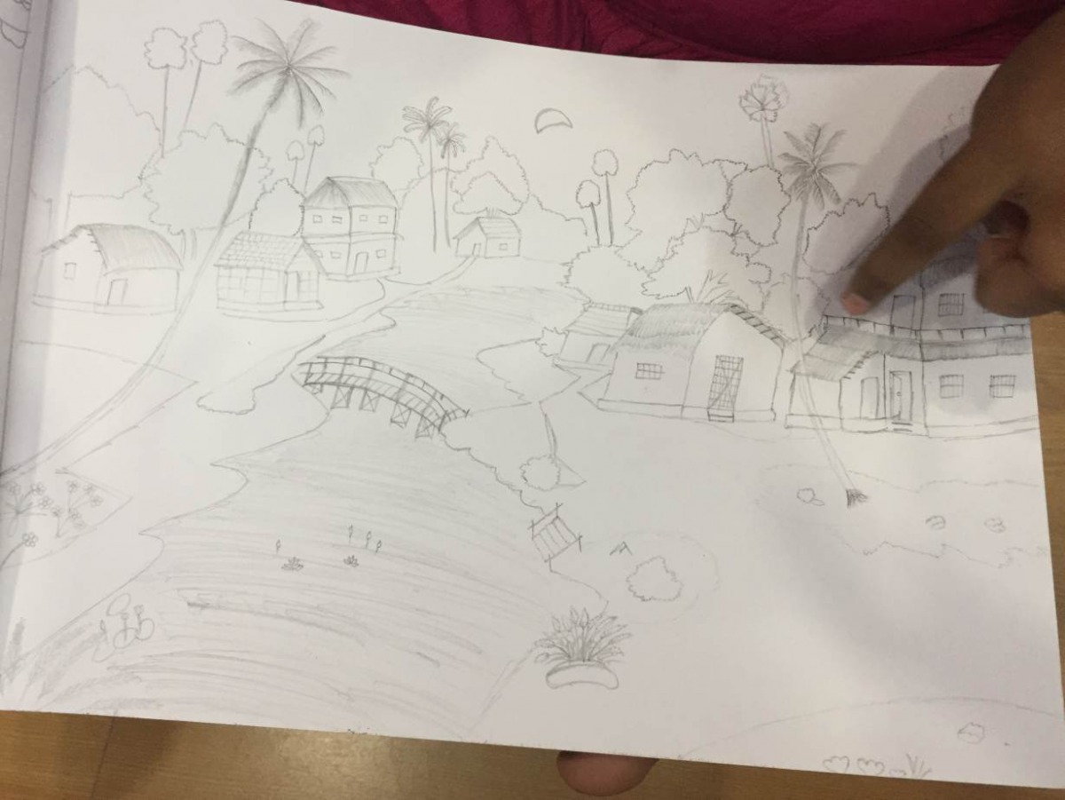 A Bangladeshi trafficking survivor shows a drawing she has made of her house at a shelter in West Bengal, India, Sept 9, 2019. Thomson Reuters / Foundation Roli Srivastava