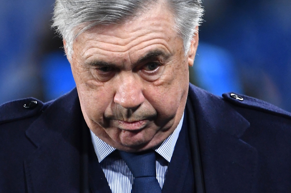 Napoli's Italian head coach Carlo Ancelotti attends the UEFA Champions League Group E football match Napoli vs Genk on December 10, 2019 at the San Paolo stadium in Naples. / AFP / Tiziana FABI