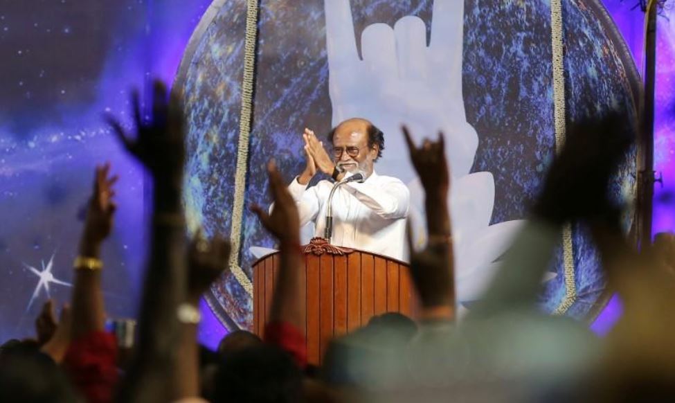 Actor Rajinikanth greets his supporters after announcing the launch of his political party in Chennai, India, December 31, 2017. REUTERS/P. Ravikumar