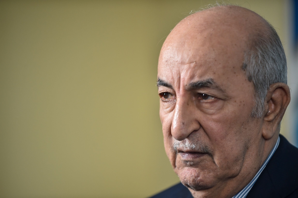Abdelmadjid Tebboune attends a forum at the headquarters of al-Hiwar newspaper in the capital Algiers In this file photo taken on November 24, 2019. AFP / Ryad Kramdi