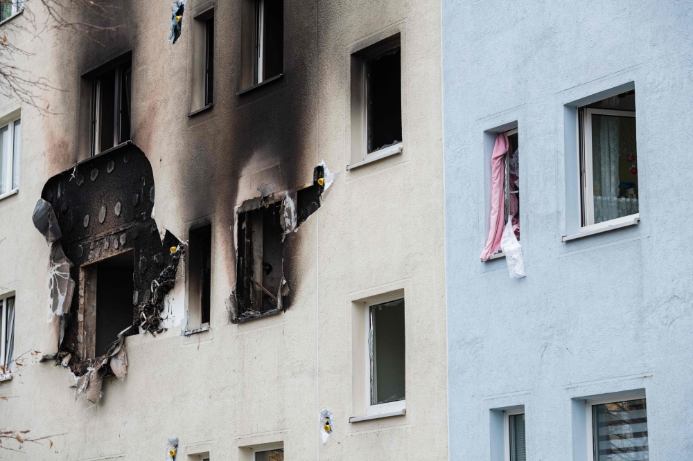 A damaged apartment building is pictured in Blankenburg, eastern Germany on December 13, 2019.  AFP / Jens Schlueter
 