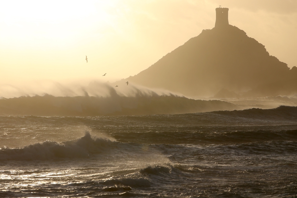 Waves crashing at the Parata Cape in Ajaccio, as the city is placed on 