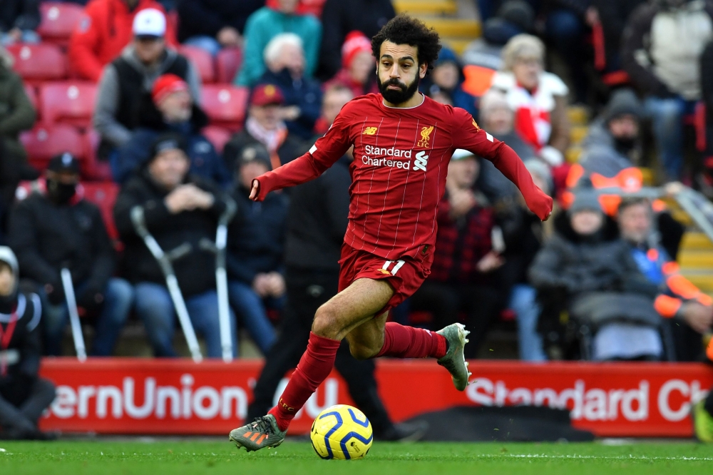 Liverpool's  Mohamed Salah  during the English Premier League football match between Liverpool and Watford at Anfield in Liverpool, north west England on December 14, 2019. / AFP
