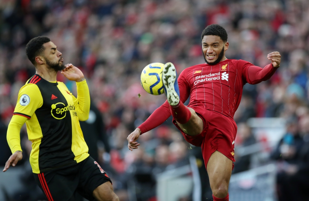 Liverpool's Joe Gomez in action with Watford's Andre Gray Action Images via Reuters/Carl Recine 