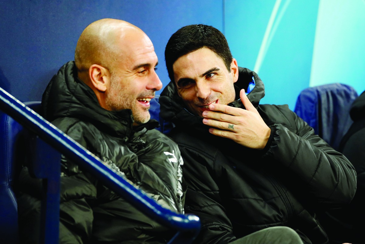 Manchester City manager Pep Guardiola (left)and assistant coach Mikel Arteta before the Champions League match against Shakhtar Donetsk at the Etihad Stadium, in Manchester, Britain in this November 26, 2019 file picture.  Action Images via Reuters/Jason 