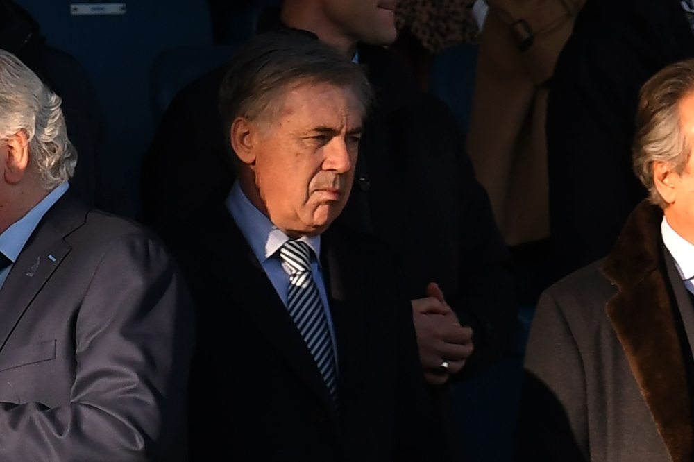 Everton's Italian head coach Carlo Ancelotti looks on from the director's box during the English Premier League football match between Everton and Arsenal at Goodison Park in Liverpool, north-west England on December 21, 2019. / AFP / Paul ELLIS 