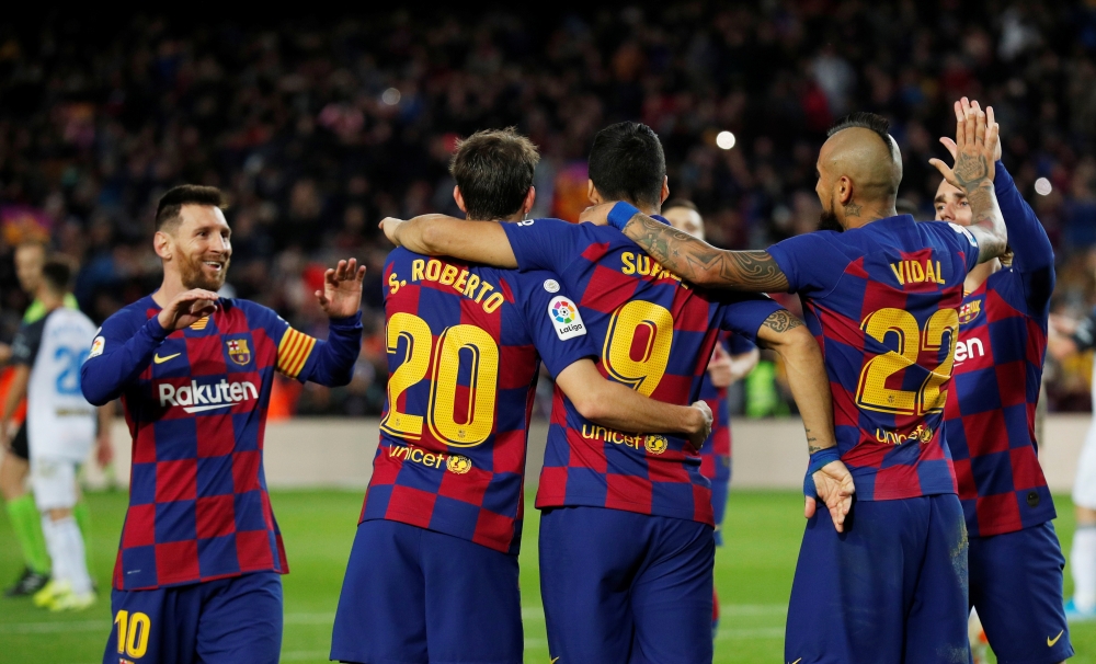 Barcelona's Luis Suarez celebrates scoring their fourth goal with teammates . Barcelona, Spain . December 21, 2019 REUTERS/Albert Gea
