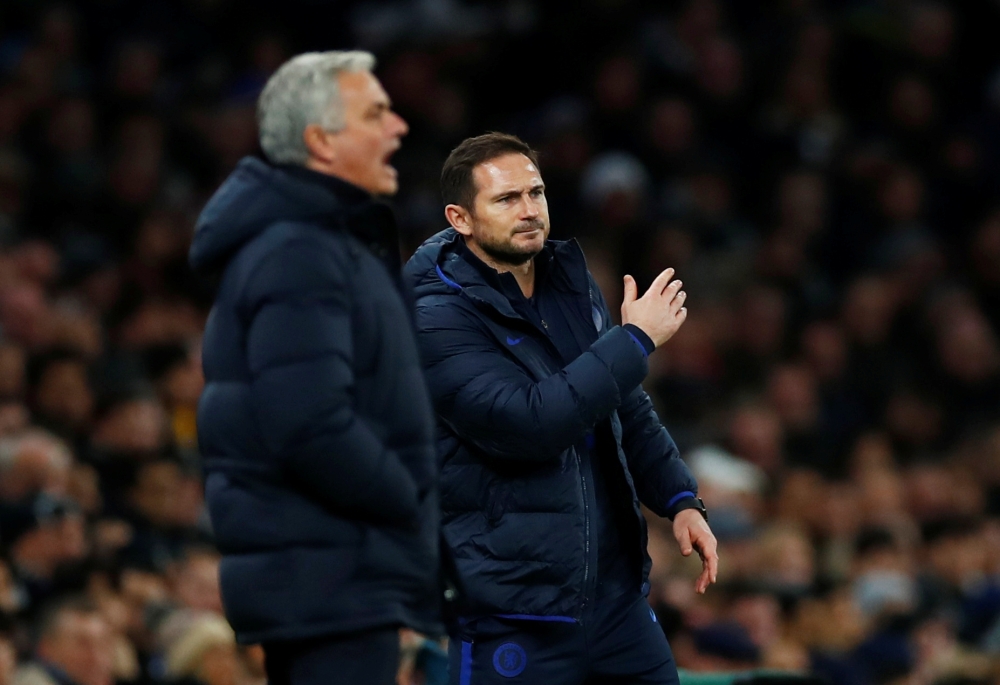 Chelsea manager Frank Lampard and Tottenham Hotspur manager Jose Mourinho react REUTERS/Eddie Keogh