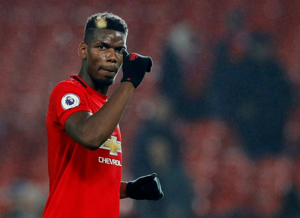 Manchester United's Paul Pogba acknowledges fans after the Premier League against Newcastle United, Old Trafford, Manchester, December 26, 2019. Reuters/Phil Noble