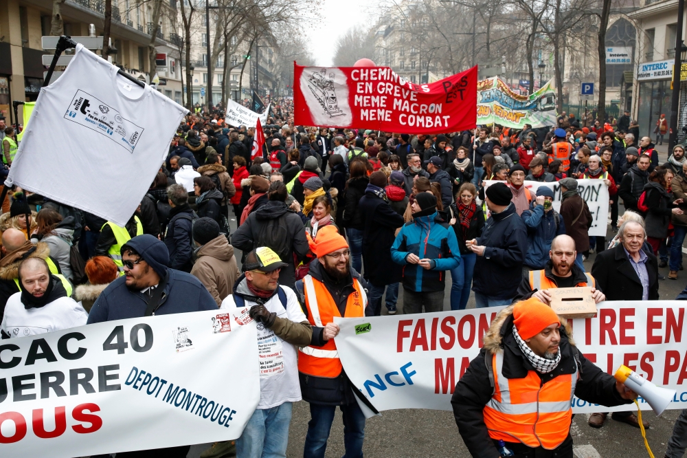 French labour union members and workers on strike attend a demonstration after 24 days of strike against French government's pensions reform plans in Paris, France, December 28, 2019. REUTERS/Benoit Tessier