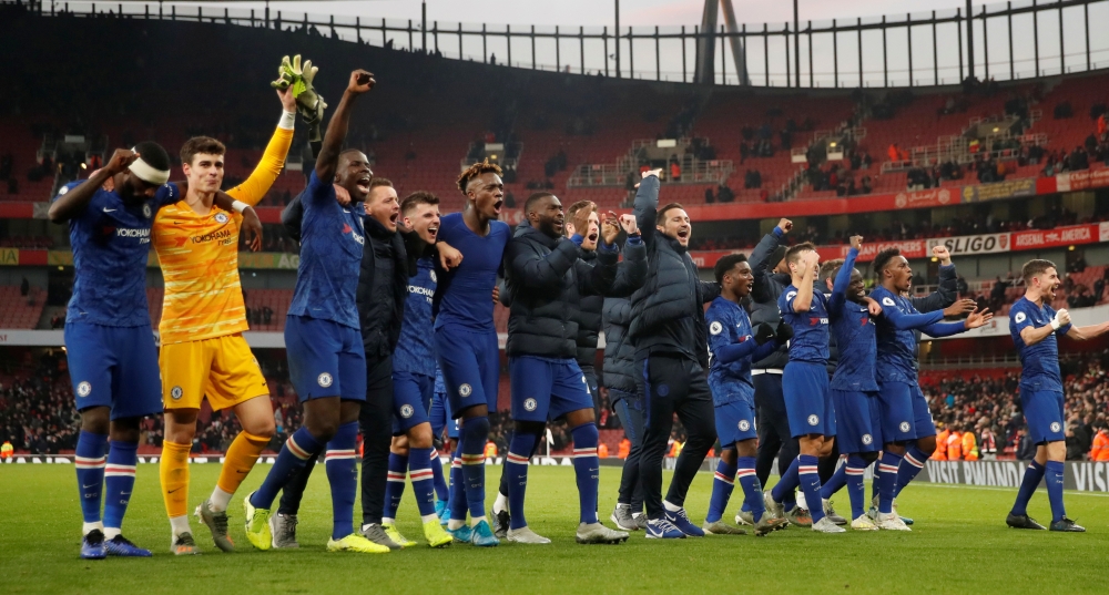 Chelsea manager Frank Lampard celebrates with their players after the match  - Arsenal v Chelsea - Premier League. London, Britain. December 29, 2019 /Reuters/Matthew Childs
