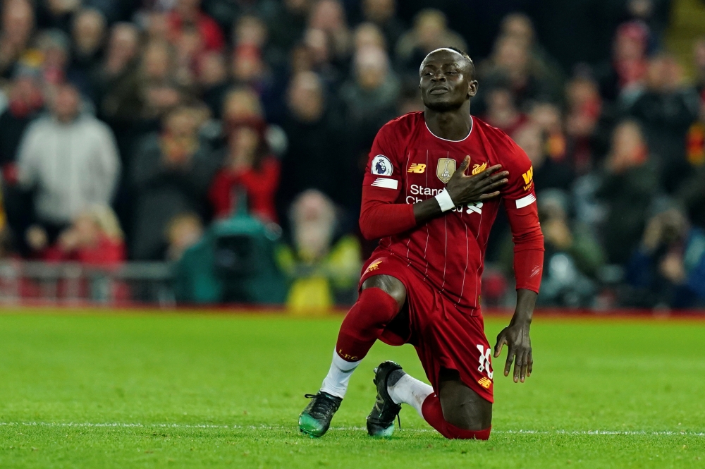  Liverpool's Sadio Mane celebrates scoring their first goal Soccer Football - Premier League - Liverpool v Wolverhampton Wanderers -  Britain. December 29, 2019. /REUTERS/Andrew 