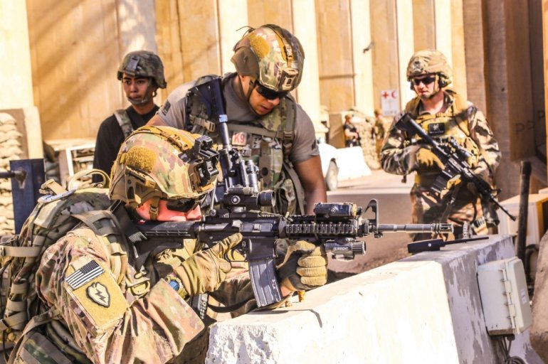 A handout picture received from the US embassy in Iraq on December 31, 2019, shows American soldiers taking position around the embassy in the capital Baghdad. AFP / US EMBASSY IN IRAQ 