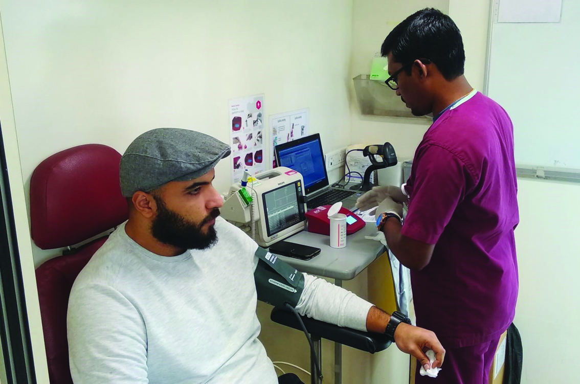 A man donates blood during the campaign in Al Shamal Municipality. 