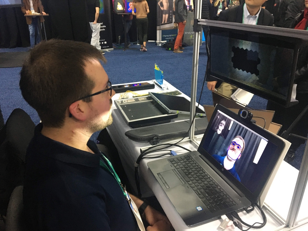 Ryan Todd of Bosch North America demonstrates a smart sun visor that uses artificial intelligence to block glare at the media preview of the 2020 Consumer Electronics Show in Las Vegas, Nevada on January 5, 2020. AFP / Robert Lever 