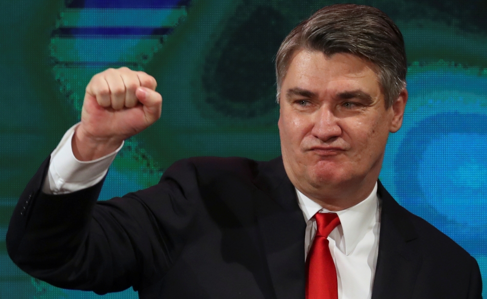 Zoran Milanovic gestures as he celebrates after first results were announced during the run-off of Croatia's presidential election in Zagreb, Croatia, January 5, 2020. (REUTERS/Marko Djurica)