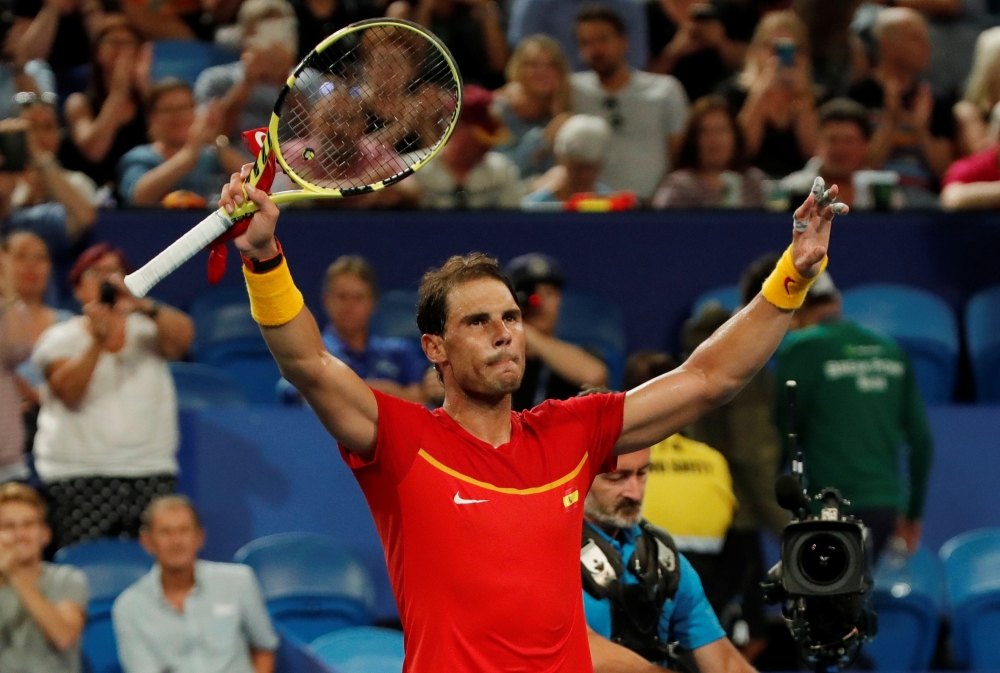 Spain's Rafael Nadal celebrates winning his Group B singles match against Uruguay's Pablo Cuevas REUTERS/Ciro De Luca