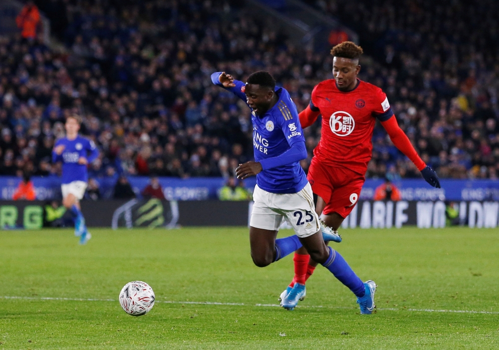 Soccer Football - FA Cup - Third Round - Leicester City v Wigan Athletic - King Power Stadium, Leicester, Britain - January 4, 2020 Leicester City's Wilfred Ndidi in action with Wigan Athletic's Jamal Lowe Action Images via Reuters/Ed Sykes
