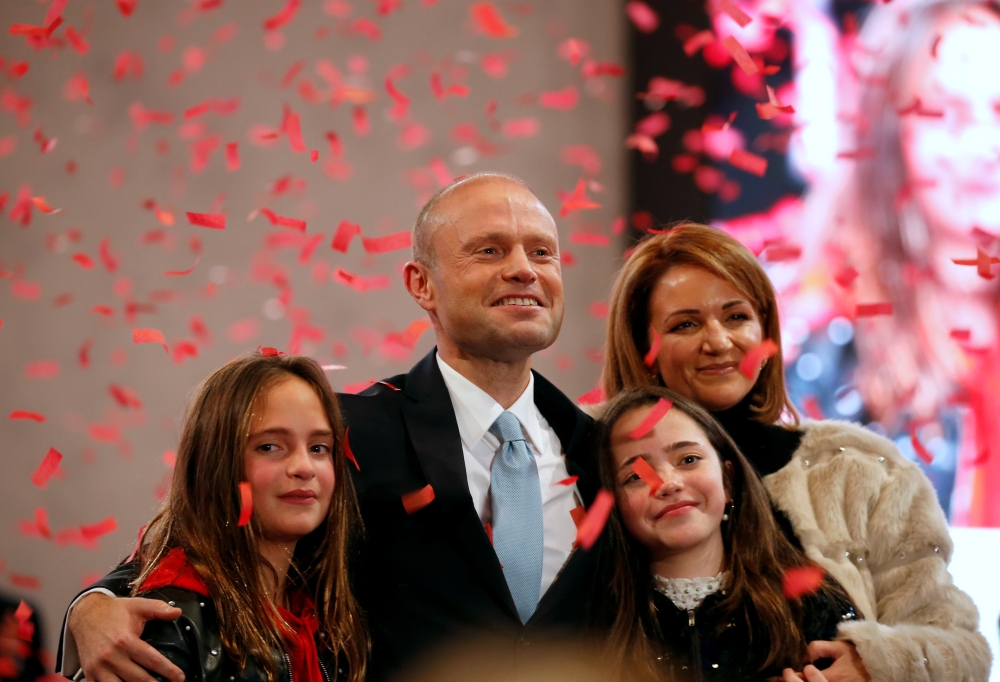Outgoing Prime Minister and Labour Party leader Joseph Muscat, accompanied by his wife Michelle Muscat and their daughters Soleil and Etoile, is seen after his final speech at the party's Congress before the election of a new party leader at the Corradino