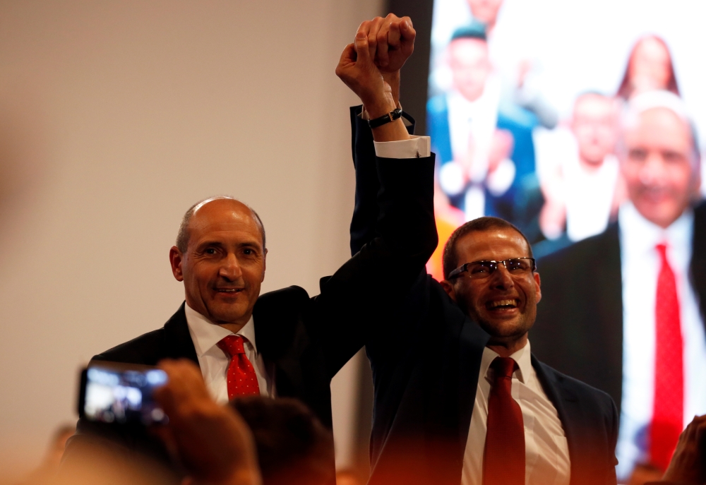 Leadership contenders Robert Abela and Chris Fearne attend outgoing Prime Minister and Labour Party leader Joseph Muscat's final speech at the party's Congress before the election of a new party leader at the Corradino Sports Pavilion in Paola, Malta Janu