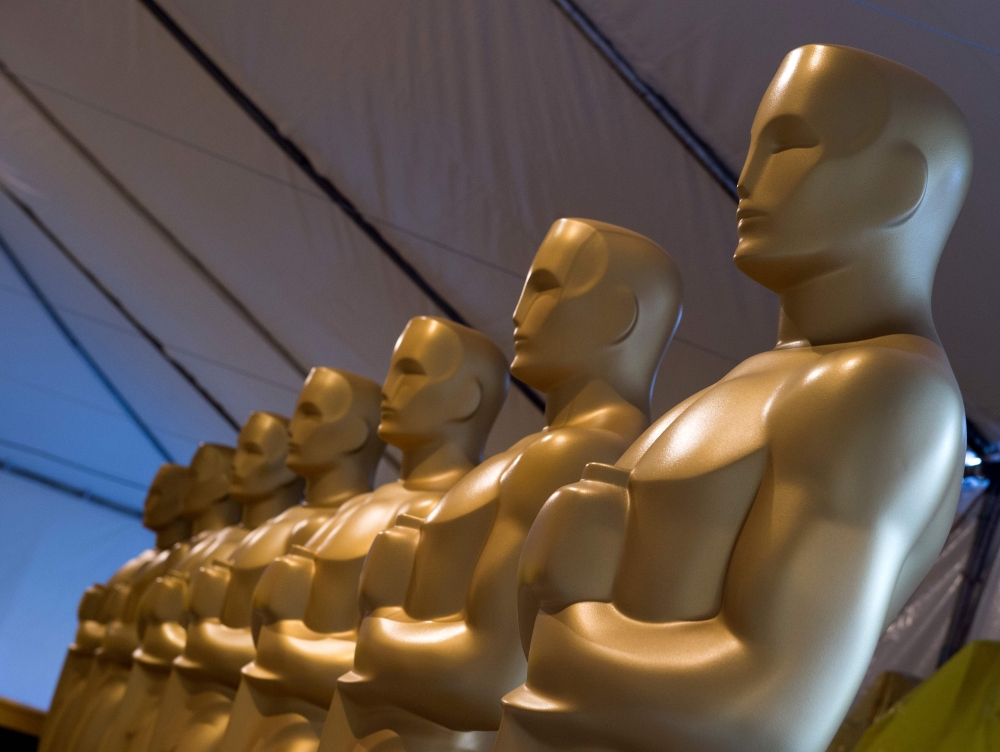 (FILES) In this file photo taken on February 24, 2016 Oscar statuettes are seen as workers make preparations for the 88th Annual Academy Awards at Hollywood & Highland Center, Hollywood, California. AFP / VALERIE MACON