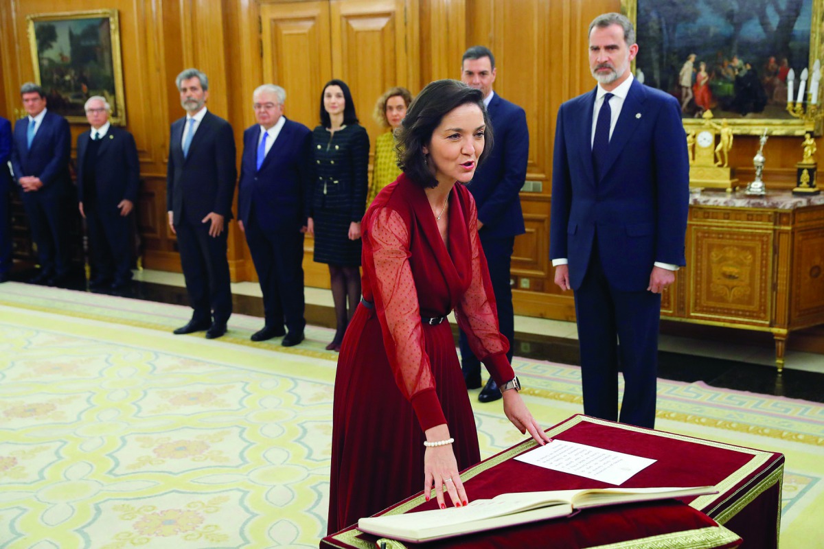 Spain's Industry Minister Maria Reyes Maroto takes the oath of office during a ceremony next to Spanish King Felipe VI at the Zarzuela Palace in Madrid, on January 13, 2020.  AFP / Chema Moya
