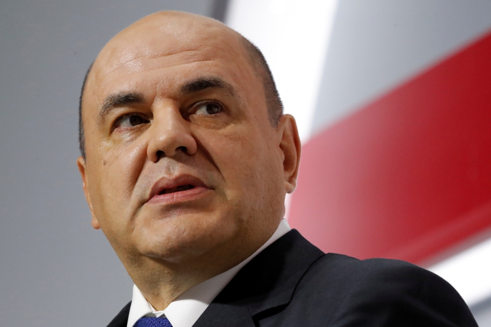 Mikhail Mishustin, head of the Russian Tax Service, attends a session of the Moscow Financial Forum in Moscow, Russia September 6, 2018. Reuters/Sergei Karpukhin