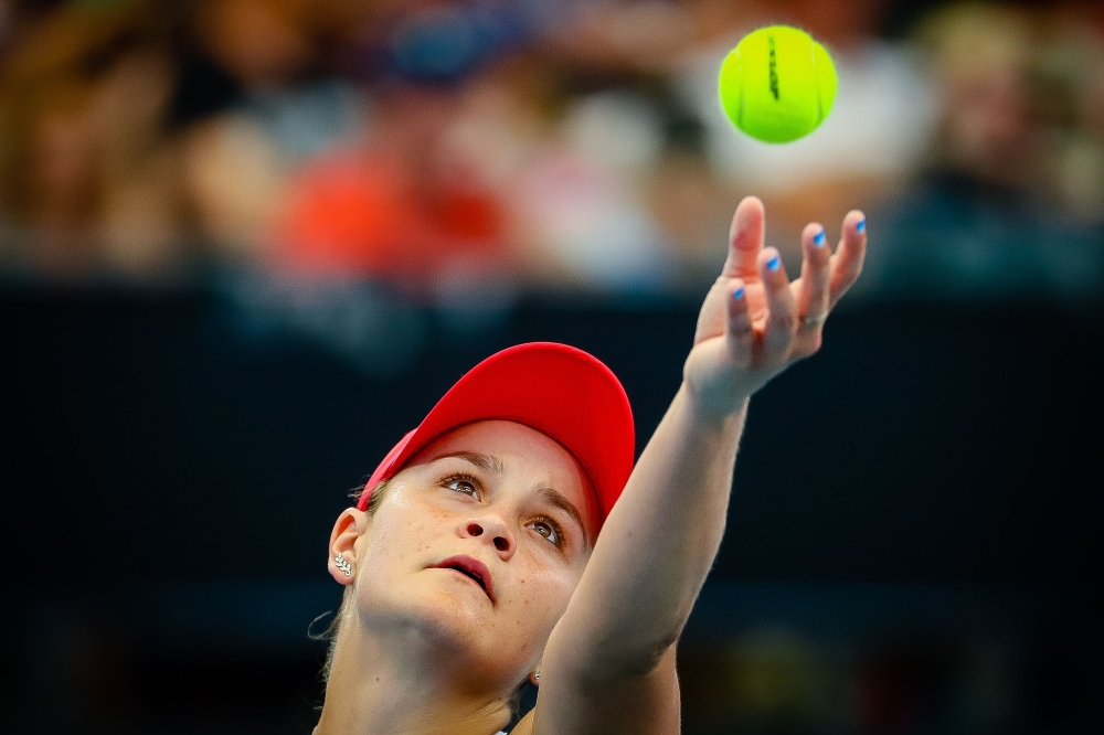 Ashleigh Barty of Australia serves against Jennifer Brady of the US during their singles match at the Brisbane International tennis tournament in Brisbane on January 9, 2020. AFP  / Patrick Hamilton