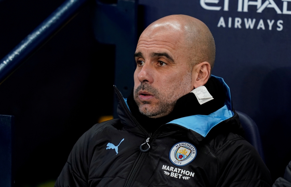 FILE PHOTO: Manchester City manager Pep Guardiola before the match REUTERS/Andrew Yates