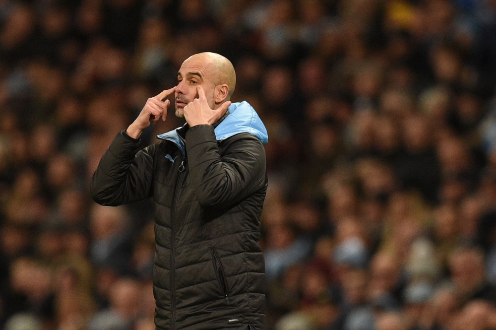 Manchester City's Spanish manager Pep Guardiola reacts during the English Premier League football match between Manchester City and Crystal Palace at the Etihad Stadium in Manchester, north west England, on January 18, 2020. AFP / Oli SCARFF