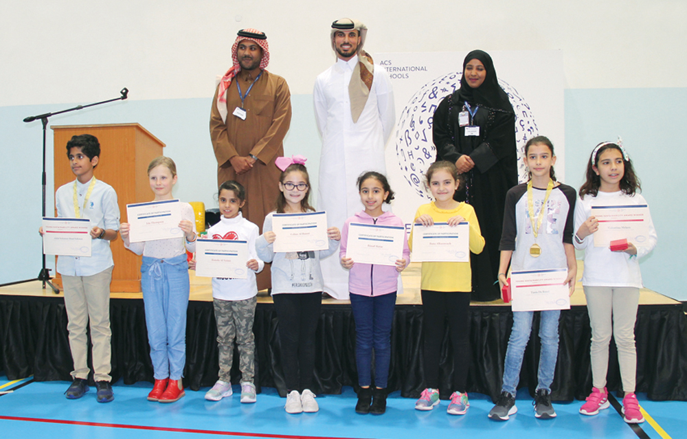 Winners and participants with officials during the award ceremony.
