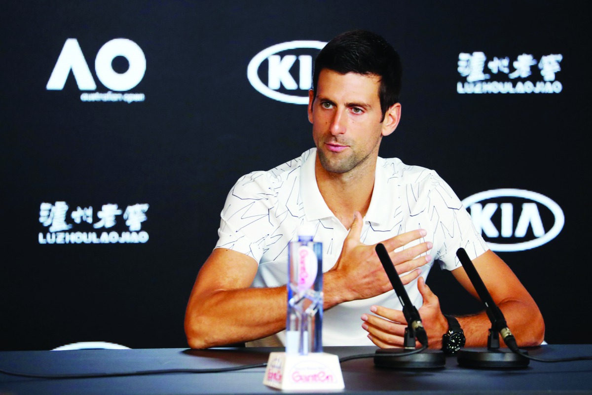 Serbia's Novak Djokovic speaks during a press conference ahead of the Australian Open tennis tournament in Melbourne on January 19, 2020. AFP / David Gray