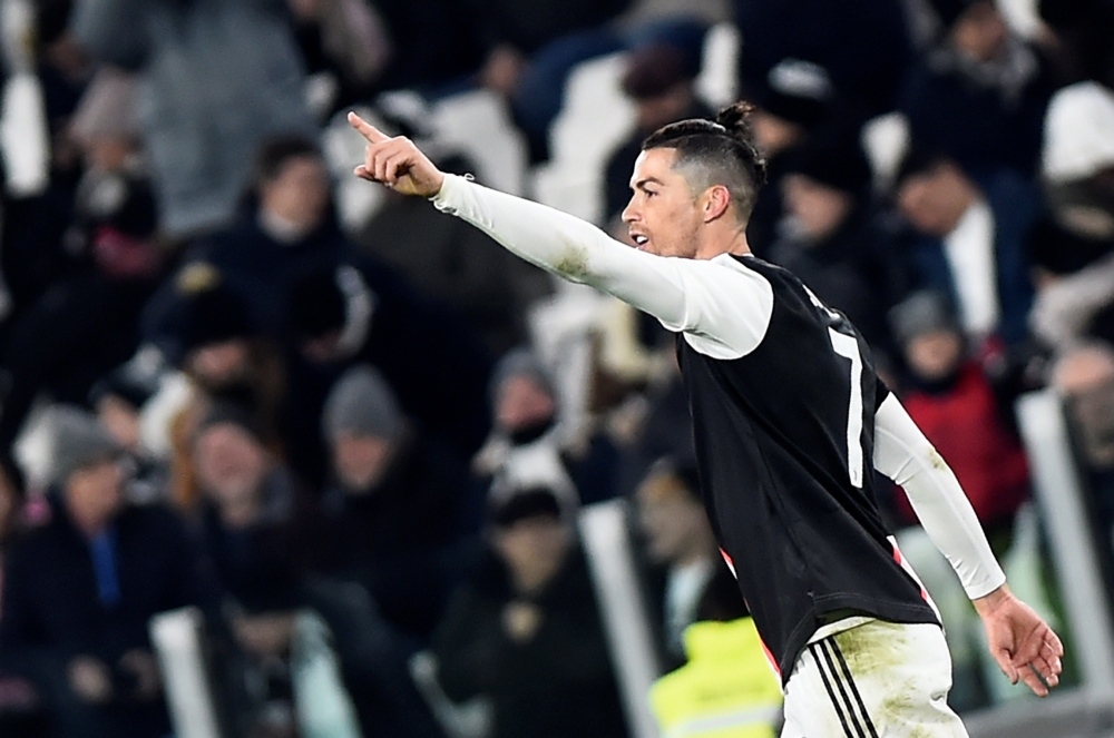 Juventus' Cristiano Ronaldo celebrates scoring their first goal REUTERS/Massimo Pinca